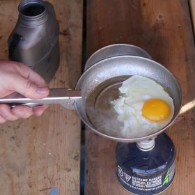 Titanium camping plate with a crystalline finish